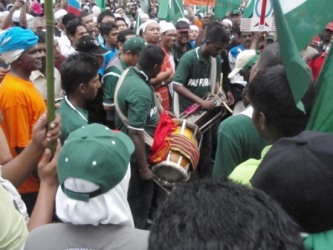 KPP boys banging away at drums and all. They were asked by the cops to stop. They did, but resumed a little further away